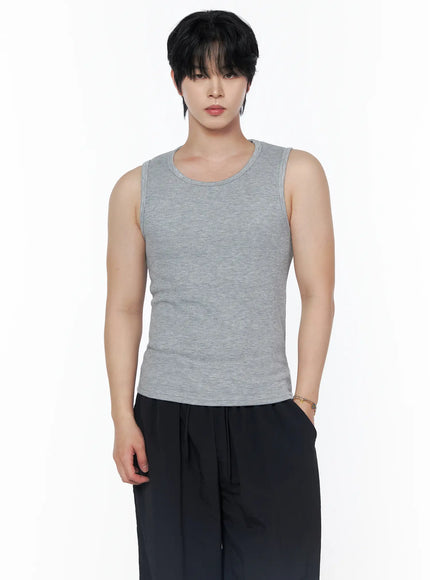 Men's Casual Tank IL502 Gray front cropped view on model showing ribbed U-neck sleeveless tank with heather gray texture, black pants