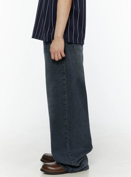 Men's Casual Washed Wide Leg Jeans IL509 Dark blue back view on model showing rear pockets with stitched detailing wide leg drape and washed fade across seat