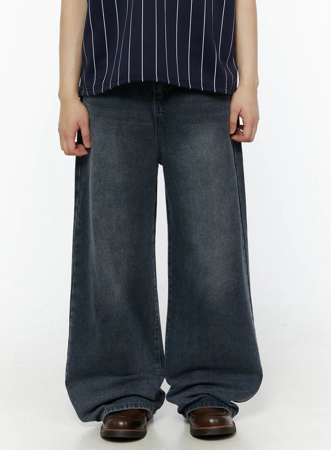 Men's Casual Washed Wide Leg Jeans IL509 Dark blue close-up front view on model showing wide leg silhouette washed denim texture and faded finish at waist and thigh