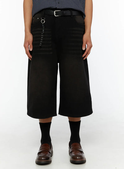 LEWKIN Men's Casual Wide Fit Jorts IL510 Black front view on model wearing belt with rope chain keyring detail, styled with checkered shirt and loafers