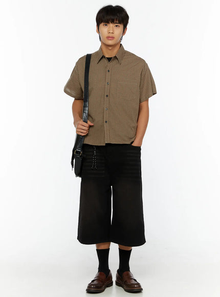 Men's Casual Wide Fit Jorts IL510 Black full-body front view on model styled with brown gingham shirt and black crossbody bag, standing straight