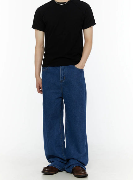 Men's Casual Wide Leg Jeans IL509 Blue full-body front shot on male model in black raglan tee, hand in pocket, standing upright showing wide-leg length