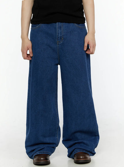 LEWKIN Men's Casual Wide Leg Jeans IL509 Blue front close-up on model wearing black top, showing wide-leg denim silhouette and front pocket stitching detail