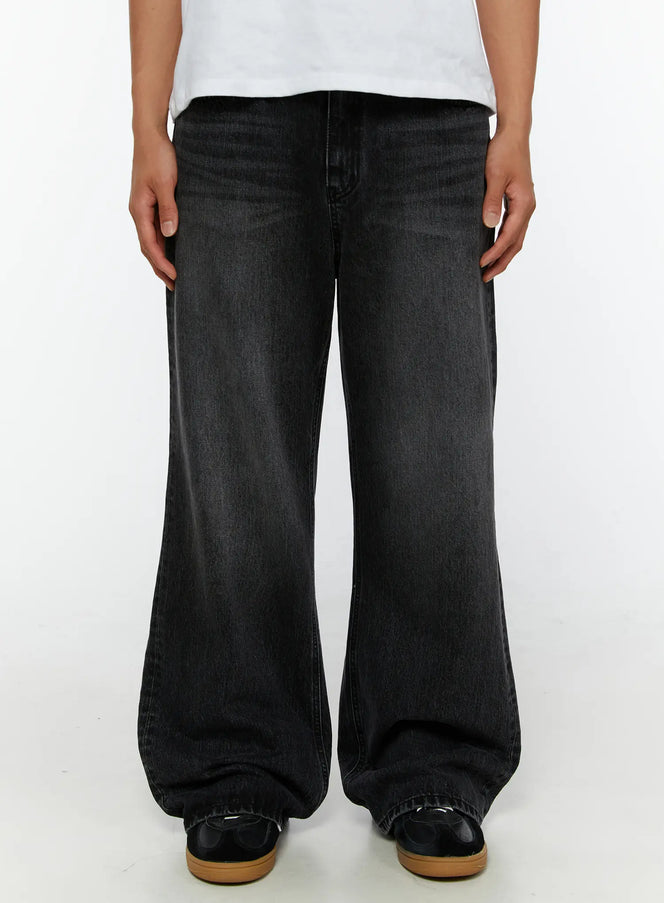 LEWKIN Men's Dark Wash Flare Jeans IL513 Black front close-up on model showing wide-leg silhouette and faded denim texture, size S
