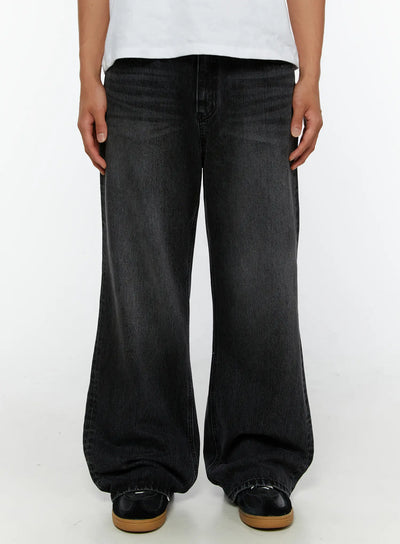 LEWKIN Men's Dark Wash Flare Jeans IL513 Black front close-up on model showing wide-leg silhouette and faded denim texture, size S