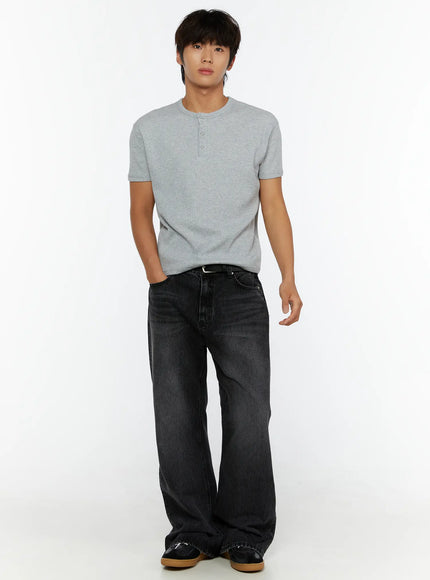 Men's Dark Wash Flare Jeans IL513 Black full front view on male model styled with grey henley ribbed tee and belt, hands in pockets