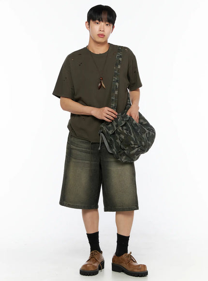 LEWKIN Men's Distressed Tee IL514 Khaki front styling shot on male model wearing camo crossbody bag, distressed holes, oversized fit