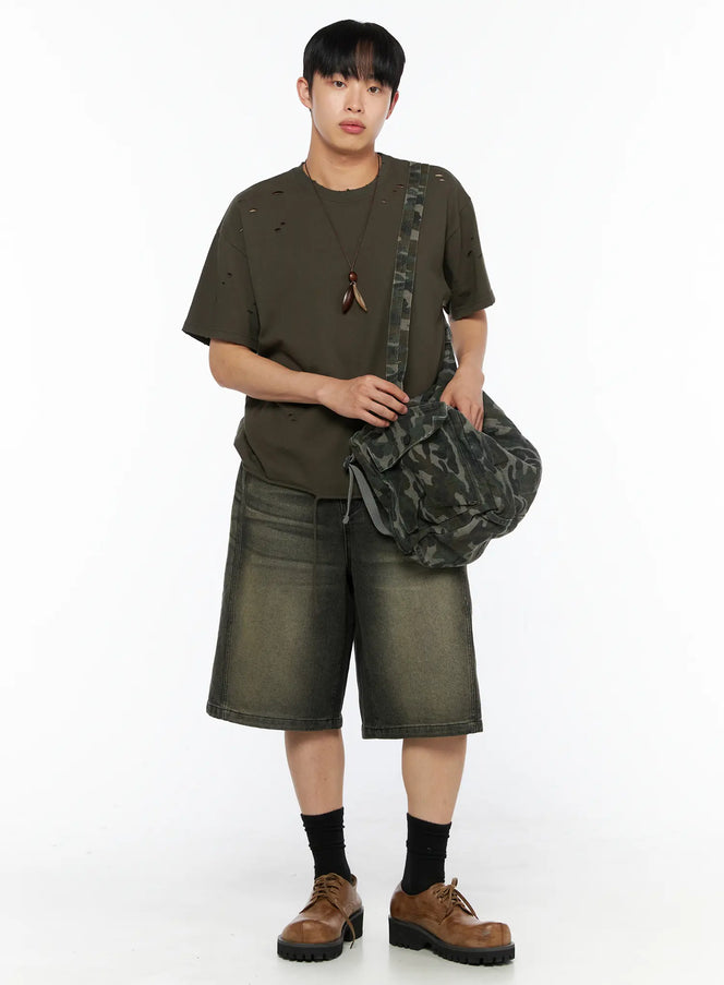 LEWKIN Men's Distressed Tee IL514 Khaki front styling shot on male model wearing camo crossbody bag, distressed holes, oversized fit