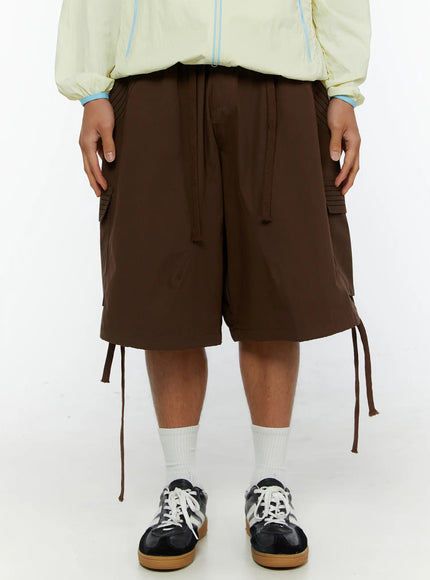 LEWKIN Men's Drawstring Cargo Shorts IL515 Brown front crop shot on model styled with light yellow windbreaker and sneakers
