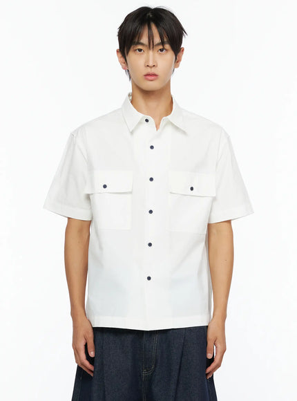 Men's Embroidered Button-Up Shirt IL528 White front close-up shot on model showing point collar dual flap chest pockets and navy snap button placket