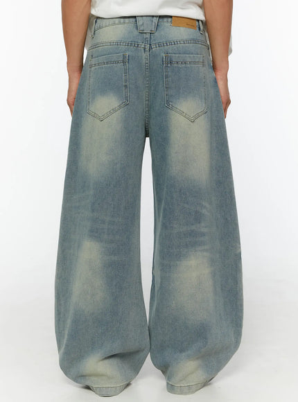 Men's Fireman Clasp Baggy Jeans IL507 Light blue back view on model showing two back patch pockets, leather patch label at waistband, and faded wash wide-leg silhouette