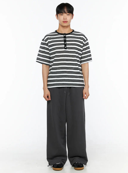 Men's Flame Wide Sweatpants (Dark Gray) IL514 Dark gray front full-body view on male model standing upright, styled with stripe henley tee and sneakers