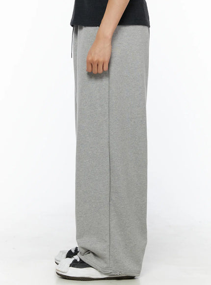 Men's Flame Wide Sweatpants (Gray) IL514 Gray side shot on model showing straight wide-leg profile drawstring waistband and full length hem drape