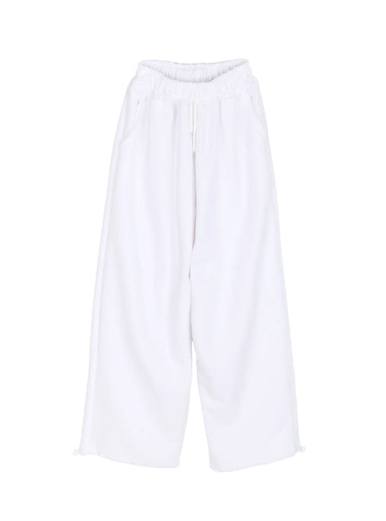 Men's Flame Wide Sweatpants (White) IL514 White flat-lay front view showing elastic drawstring waistband, wide-leg silhouette and ankle drawstring tie detail on white background