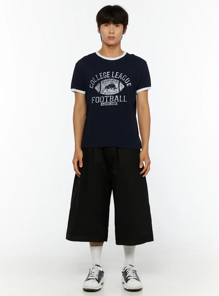 Men's Football Graphic T-Shirt IL513 Dark blue full-body front shot on model standing straight with arms at sides styled with black wide shorts