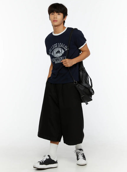 LEWKIN Men's Football Graphic T-Shirt IL513 Dark blue full-body front shot on model styled with black wide-leg shorts and crossbody bag