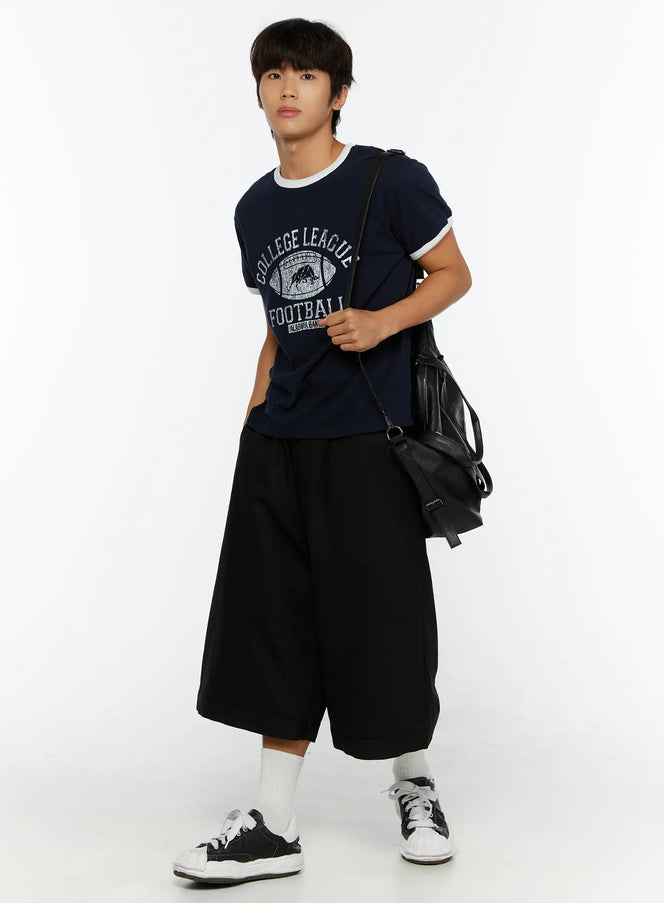 LEWKIN Men's Football Graphic T-Shirt IL513 Dark blue full-body front shot on model styled with black wide-leg shorts and crossbody bag