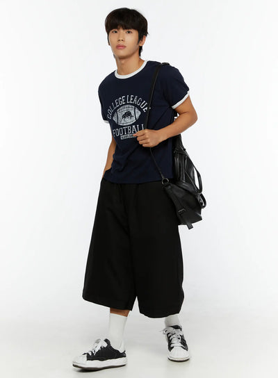 LEWKIN Men's Football Graphic T-Shirt IL513 Dark blue full-body front shot on model styled with black wide-leg shorts and crossbody bag