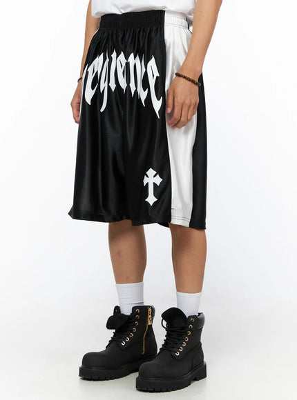 Men's Gothic Print Athletic Shorts IL515 Black angled front view on model showing gothic Vengeance text and white side panel with cross graphic detail