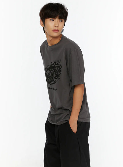 Men's Graphic Car Print T-Shirt IL513 Dark gray side shot on model gazing left showing flame car graphic cotton fabric drape with black trousers