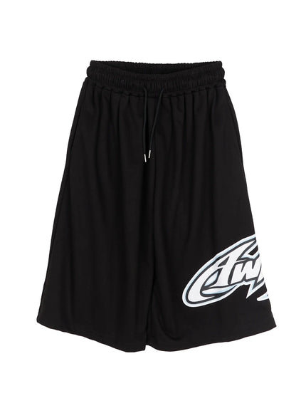 Men's Graphic Logo Shorts (Black) IL502 black flat-lay front showing full silhouette elastic drawstring waistband wide-leg cut and oversized blue white graphic logo print