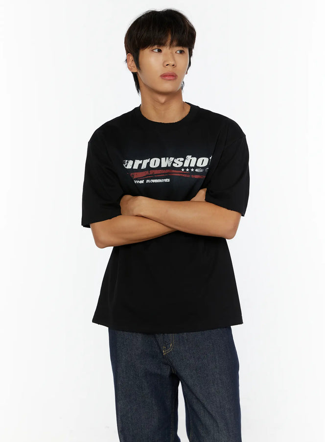 LEWKIN Men's Graphic Oversized T-Shirt IL515 Black front shot on male model with arms crossed styled with dark indigo jeans