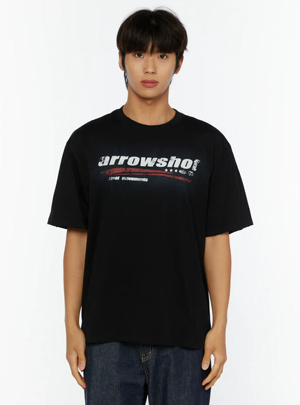 Men's Graphic Oversized T-Shirt IL515 Black front shot on male model showing arrowshot white and red distressed graphic print on oversized cotton tee with raw hem
