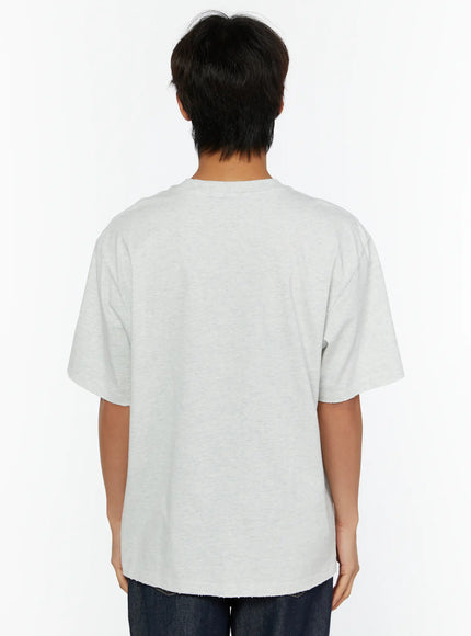Men's Graphic Oversized T-Shirt IL515 Light Gray back shot on male model showing clean plain back and raw-cut hem with relaxed oversized cotton silhouette