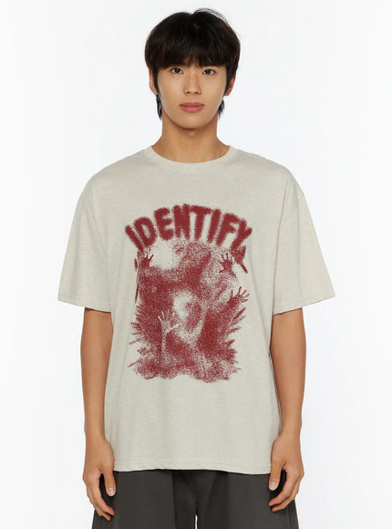 Men's Graphic Oversized Tee IL515 Oatmeal front view on male model dark red IDENTIFY dotwork figure graphic print crewneck oversized cotton tee