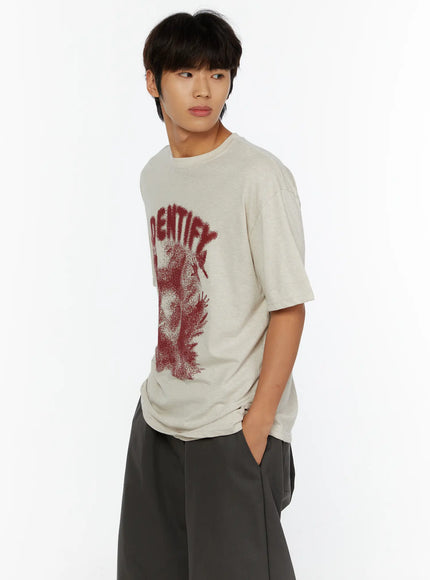 Men's Graphic Oversized Tee IL515 Oatmeal side view on male model hand in pocket dark red IDENTIFY dotwork figure graphic print