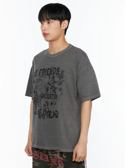 Men's Graphic Pigment Dyed Tee IL514 Charcoal grey side shot on male model showing No Friends In The Industry graphic print and dropped shoulder seam