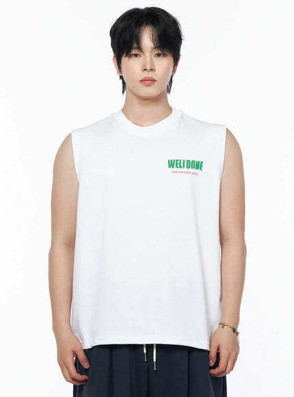 Men's Graphic Print Sleeveless Tee IL502 White close-up front shot on male model cropped at waist highlighting green WELLDONE chest logo graphic print