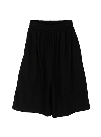 Men's Graphic Print Sweat Shorts IL515 Black flat-lay front view showing elastic waistband and clean wide-leg silhouette, no graphic print