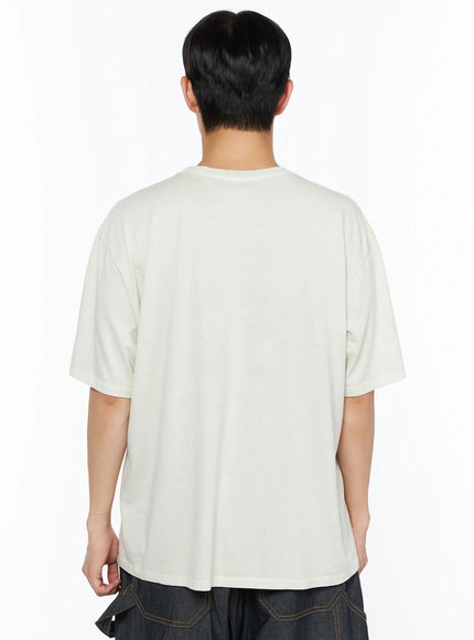 Men's Graphic Print Tee IL510 Light beige back shot on male model showing plain cotton back panel drop shoulder and relaxed oversized silhouette