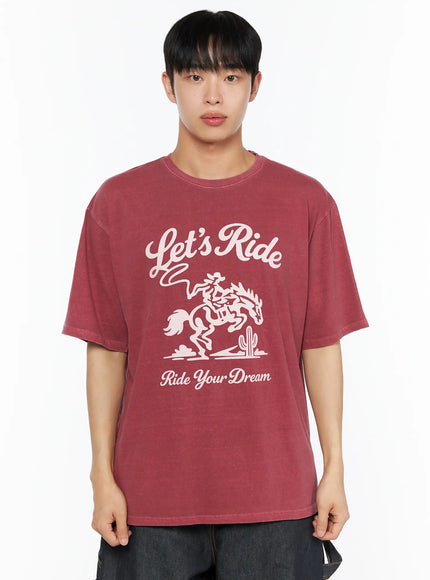 Men's Graphic Print Tee IL510 Red front upper-body shot on male model showing bold pink Let's Ride cowboy horse graphic print on washed red cotton tee