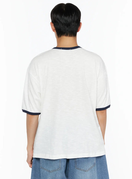 Men's Graphic Ringer T-Shirt IL510 White back shot on male model showing clean plain back, navy ringer collar and cuffs, slub cotton fabric texture