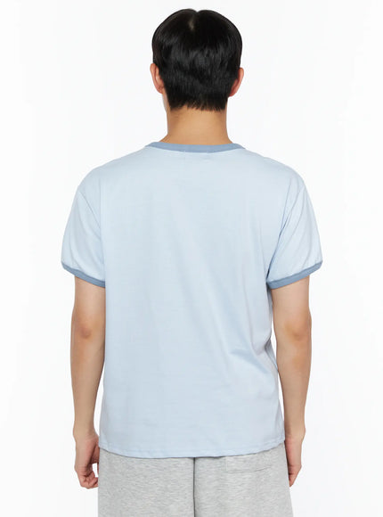 Men's Graphic Ringer Tee IL514 Light blue back shot on male model showing plain back panel, contrast teal crew neckline and sleeve cuff trim detail