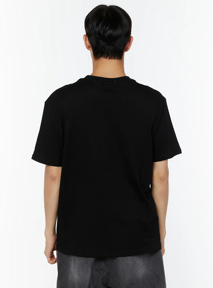 Men's Graphic Round Neck T-Shirt IU529 Black back shot on male model showing clean plain back drop-shoulder seam and relaxed oversized silhouette in heavyweight cotton