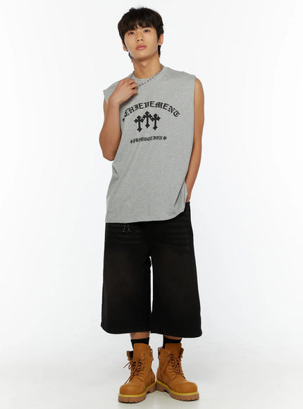 Men's Graphic Sleeveless Tee IL510 Gray full-body front shot on male model with wide stance hands behind back styled with black wide-leg shorts and tan boots