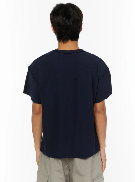 Men's Graphic Slogan T-Shirt IL509 Dark blue back shot on male model revealing plain navy cotton back panel with raw-cut shoulder and sleeve edges