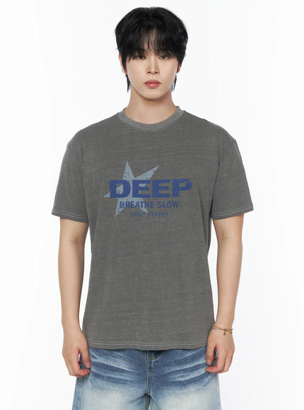 Men's Graphic Star T-Shirt IU523 Gray front shot on male model upper body, blue DEEP BREATHE SLOW star graphic, ribbed crewneck, white contrast stitch