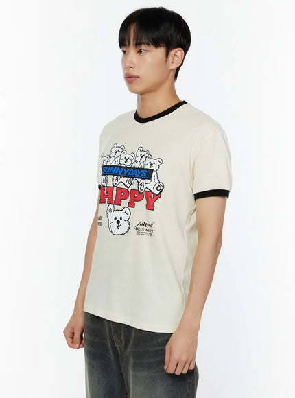 Men's Graphic T-Shirt IU529 Light beige side close-up view on male model three-quarter angle showing SUNNYDAYS HAPPY bear chest print black ringer trim cotton fabric detail