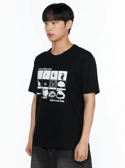 Men's Graphic Tee IL514 Black side shot on male model showing graphic print detail with moon plant and eye motif grid design