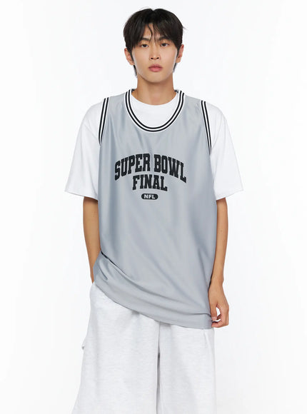 Men's Graphic Varsity Jersey IL515 Gray front shot on male model standing upright, Super Bowl Final NFL black print, black-striped neckline, layered over white tee