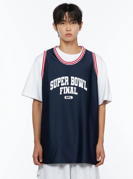 Men's Graphic Varsity Jersey IL515 Dark blue close-up front shot on male model from chest up, Super Bowl Final NFL white print and red-striped V-neckline detail visible