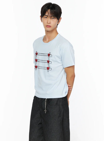 Men's Heart Graphic T-Shirt IL515 Light Blue side shot on male model three-quarter angle displaying red heart loop graphic on pale blue tee