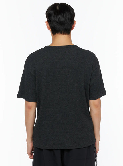 Men's Henley Waffle Tee IL514 Charcoal back shot on male model showing clean plain back panel and waffle knit texture with ribbed hem