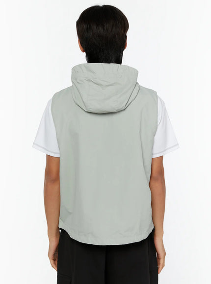 Men's Hooded Zip-Up Vest IL513 Gray full-body front shot on male model adjusting headphones wearing backpack and black cargo shorts