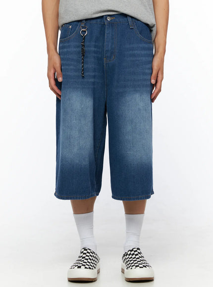 LEWKIN Men's Keyring Detail Jorts IL515 blue front close-up on model showing wide-leg washed denim silhouette with rope keyring accent and checkerboard sneakers