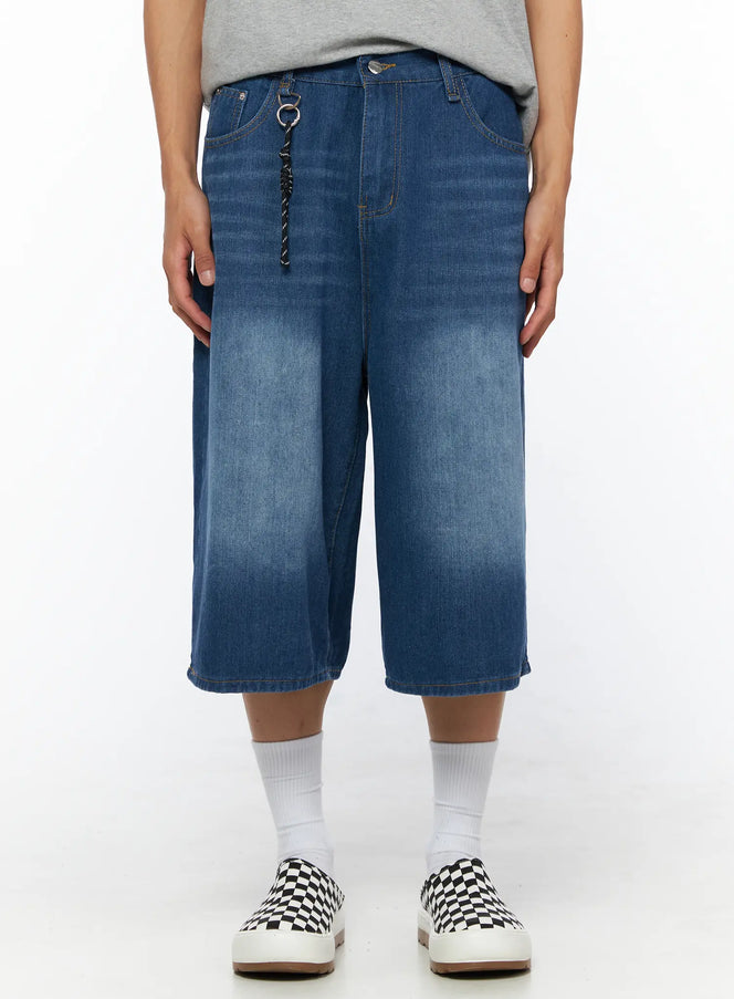 LEWKIN Men's Keyring Detail Jorts IL515 blue front close-up on model showing wide-leg washed denim silhouette with rope keyring accent and checkerboard sneakers